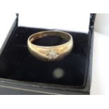 9 Carat Yellow Gold Gents Diamond Ring. Set with a single diamond. Total Piece Weight Approx. 3.40G