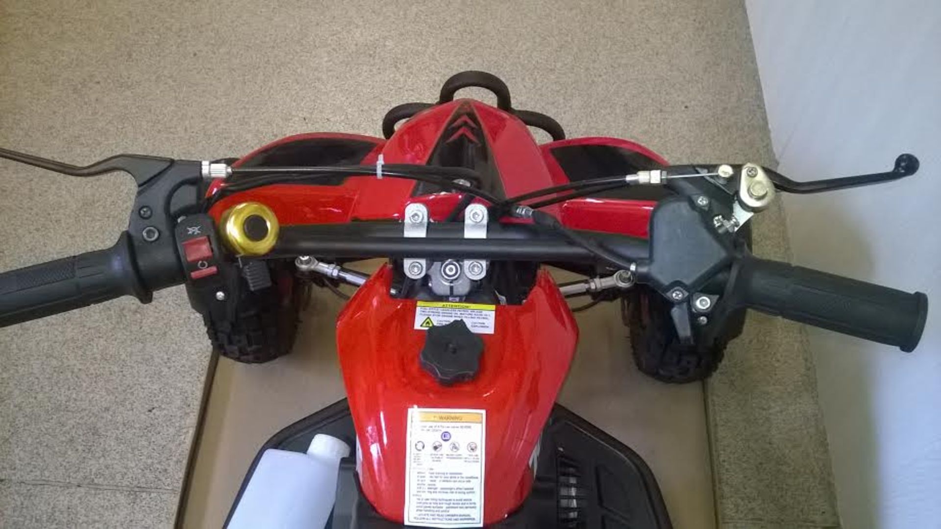 1 BRAND NEW BOXED NO VAT 49CC 2STROKE PETROL MINI ATV QUAD BIKE 2015 MODEL IN RED.
This is the - Image 7 of 8