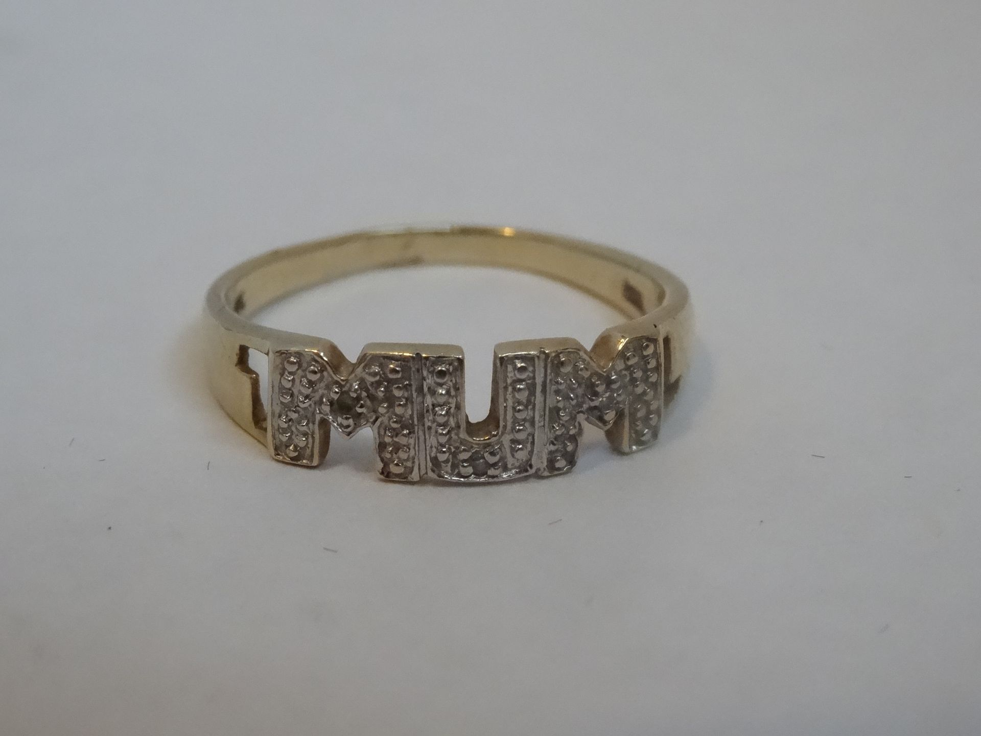 9 Carat Yellow Gold Diamond 'Mum' Ring. Total Piece Weight 1.66 Grams