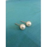 A Pair of Hallmarked 9ct Gold Pearl Earrings. The Pearls Measuring 5mm Diameter. Delivery
