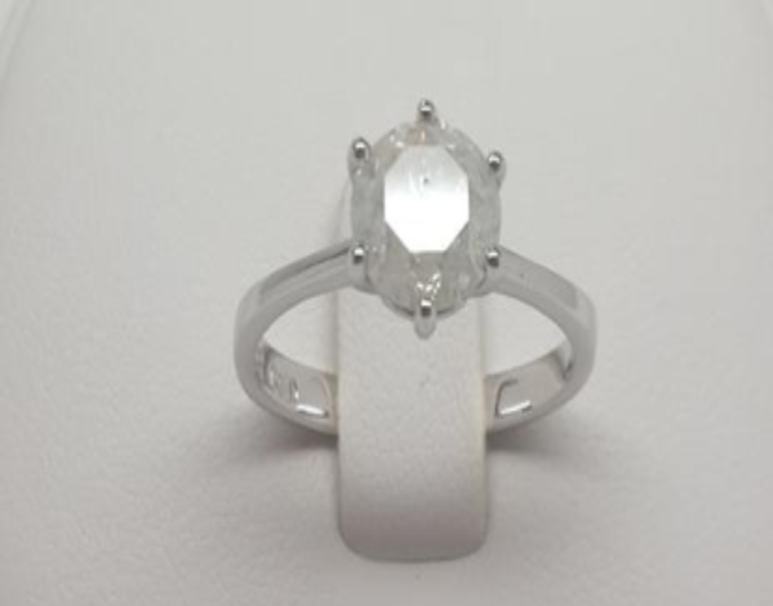 A 1.5 Carat Solitaire Diamond Set in 14k white gold. A single stone set in a classic six claw