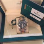 Rolex GMT 11 unworn 116713LN ceramic bezel with box and warranty card.