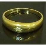 A gentlemans single stone ring, a brilliant cut diamond set in 9 carat gold 2gms