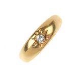An 18ct Gold Diamond single stone gentlemans ring. With a single briliant cut diamond. Estimated