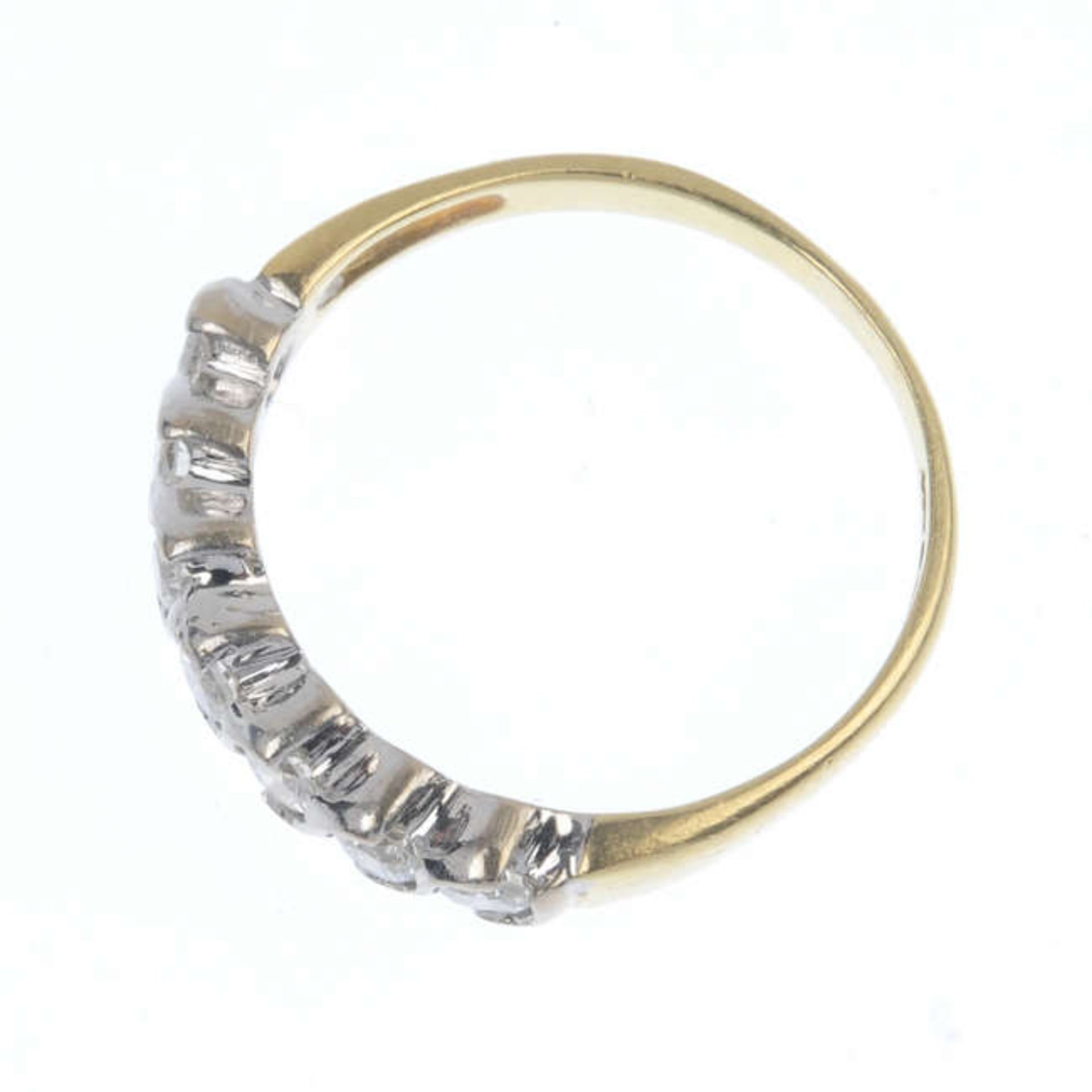 An 18ct gold diamond seven-stone ring. Each brilliant-cut diamond, within a curved spacer, to the - Image 2 of 3