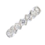 An 18ct gold diamond seven-stone ring. Each brilliant-cut diamond, within a curved spacer, to the