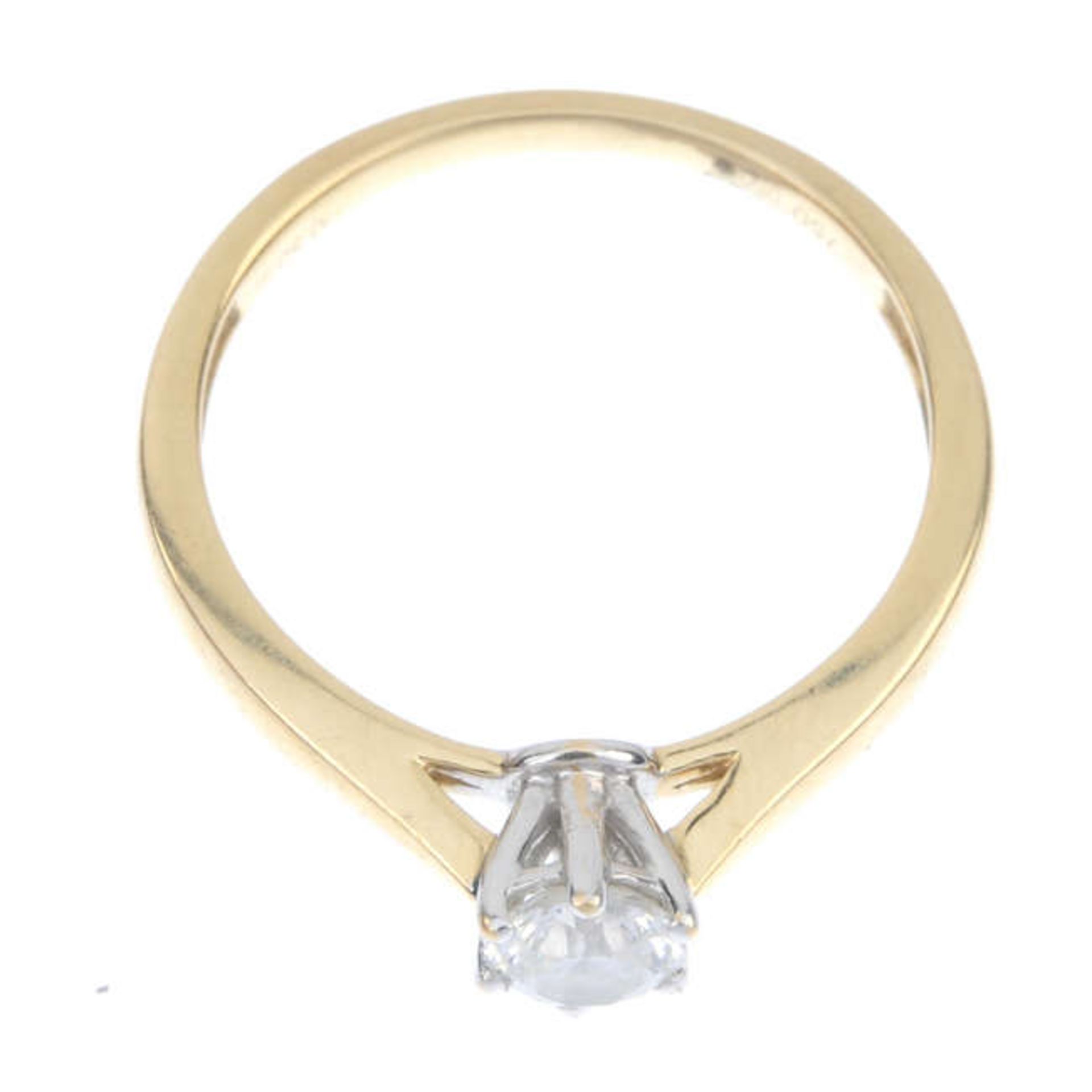 An 18ct gold diamond single-stone ring. The brilliant-cut diamond, to the plain band. Diamond weight - Image 2 of 3