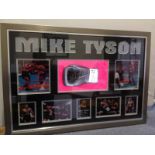 Mike Tyson signed glove with lights. Frame size (inches): 38x26