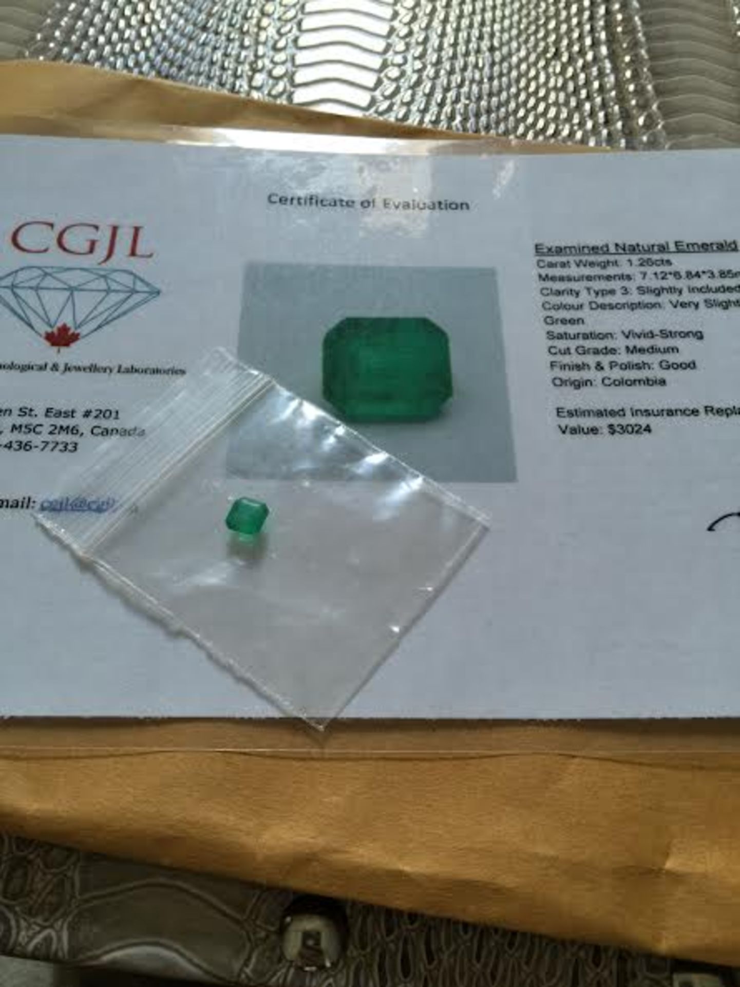 1.26 ct natural emerald with certificate