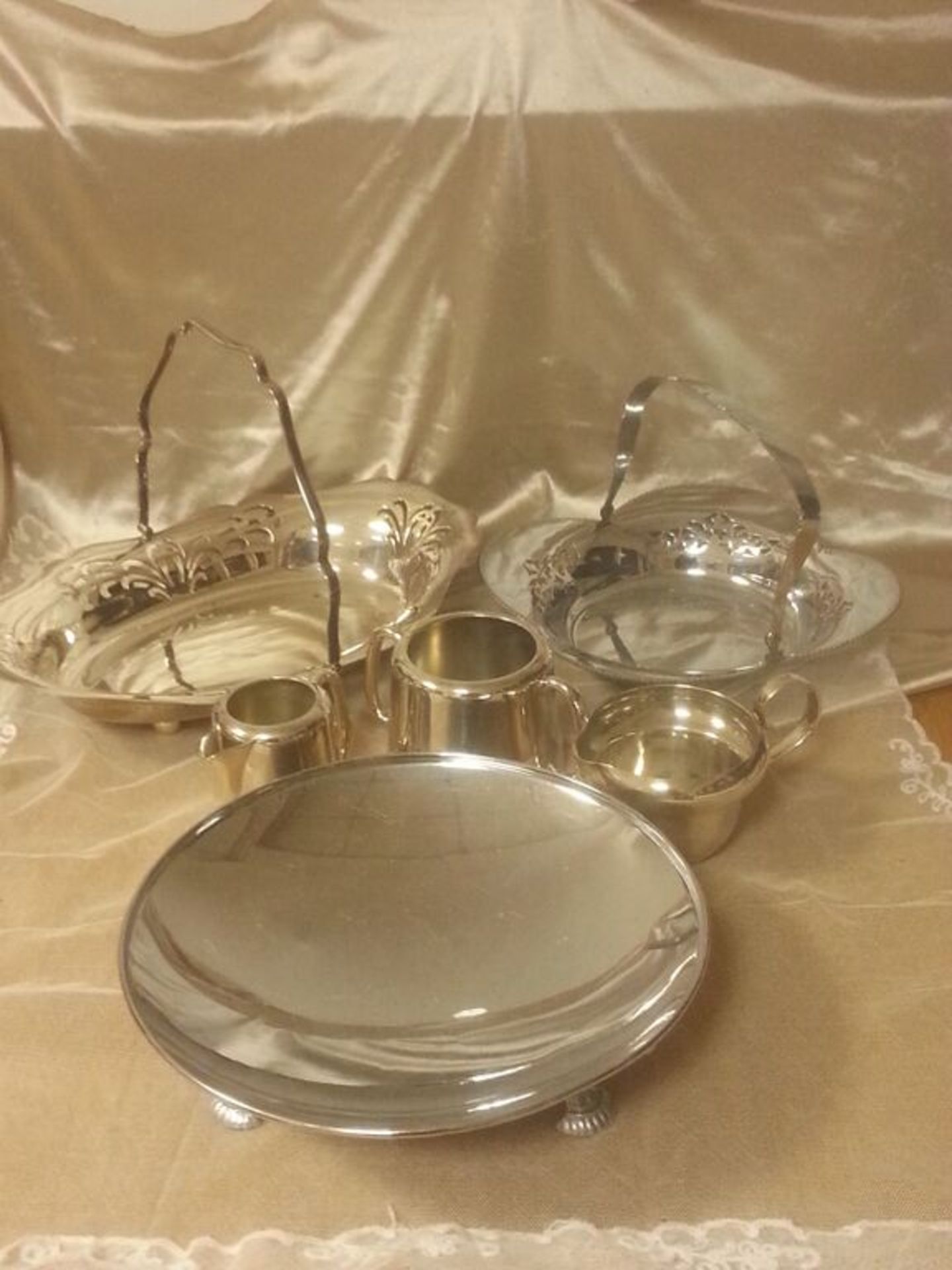 A Group of Silver Plated Items to Include Cake Baskets, Milk Jugs ,Sugar Bowls (6)