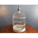 Late 19th century brass bird cage Late 19th century brass and iron circular bird cage.
DIMENSIONS