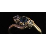 A 9ct Gold Blue stone and Diamond trilogy twist ring, ( TWC 0.1 ,  GW 2 )