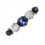 A mid 20th century 18ct gold sapphire and diamond five-stone ring. The circular-shape sapphires,