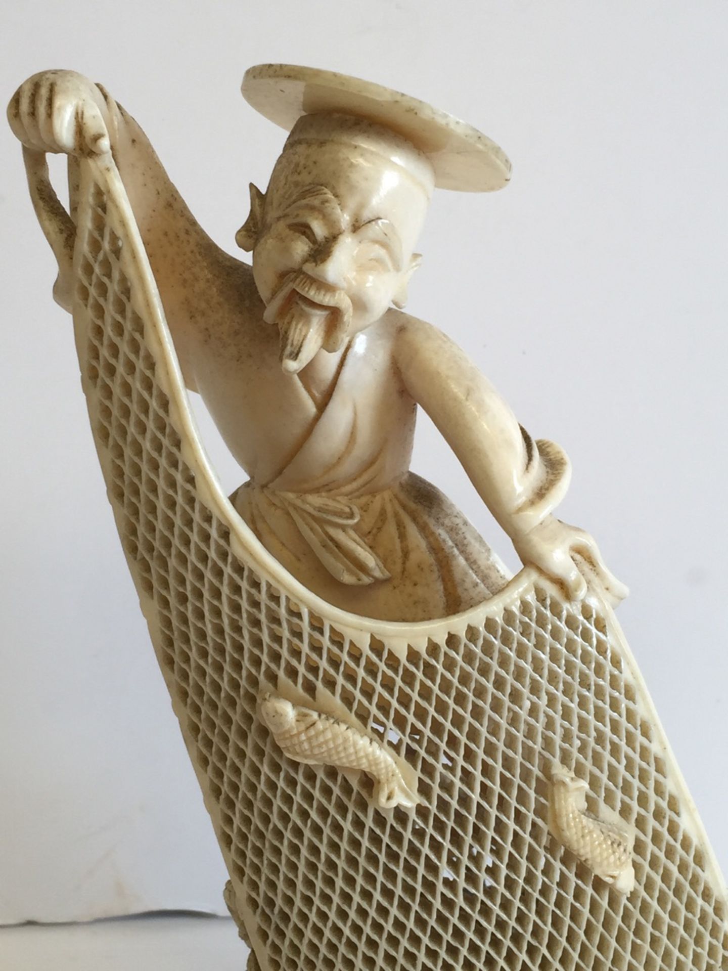 A Meiji Period Japanese Ivory Carving of a Fisherman - Image 2 of 7