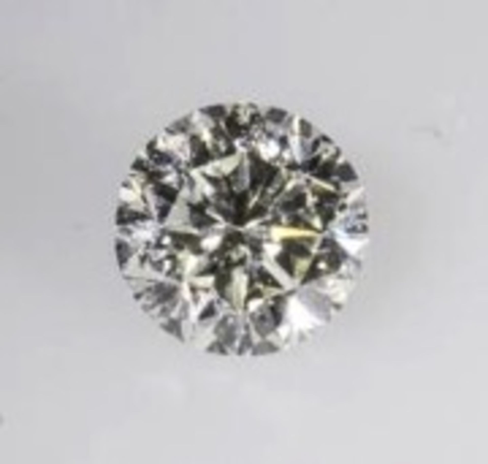A 0.20 Carat round, brilliant cut diamond. Please add £4.10 to final hammer price for postage &