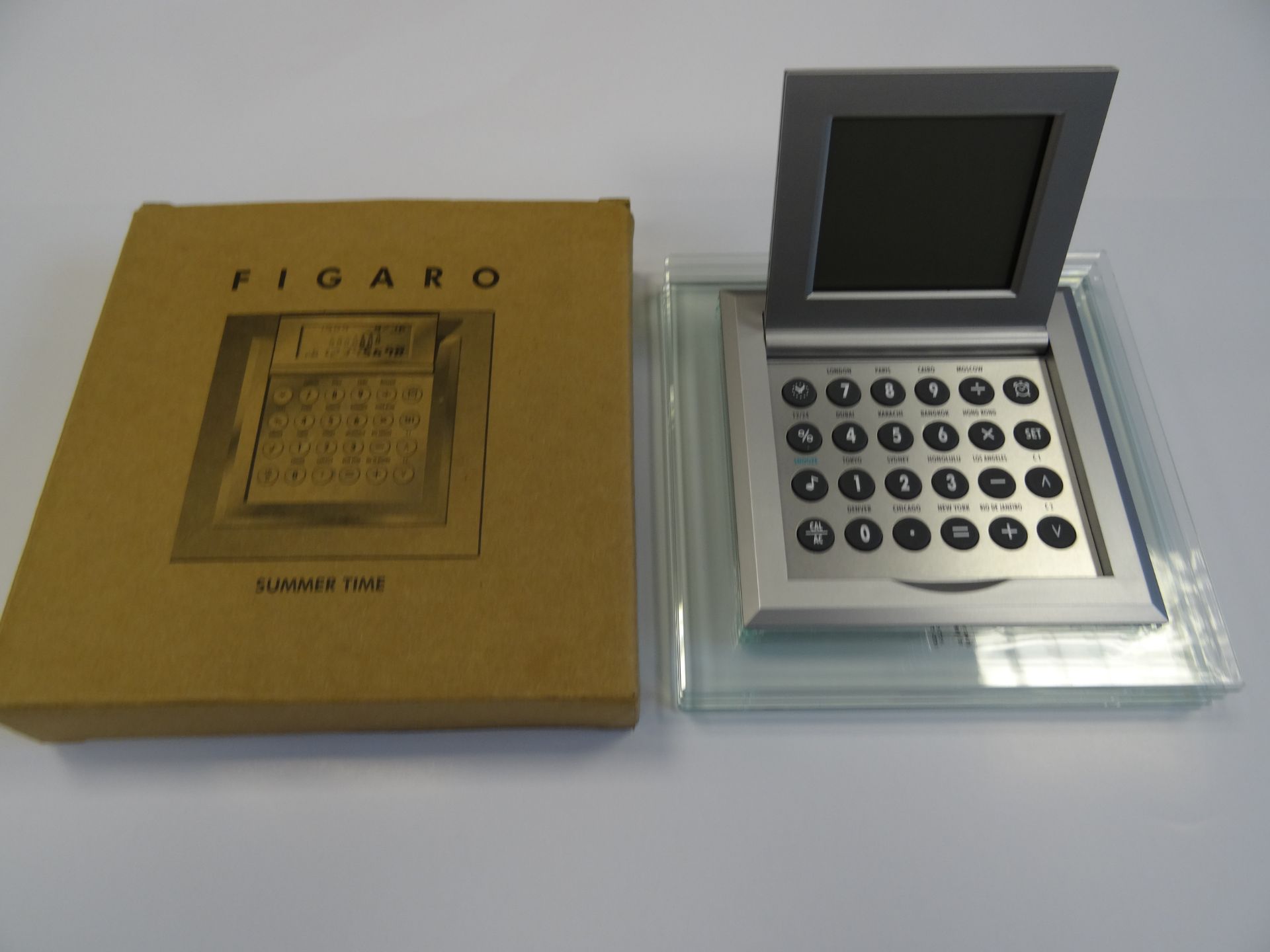 Desktop clock /calculator set in clear perspex surround x 40 Units