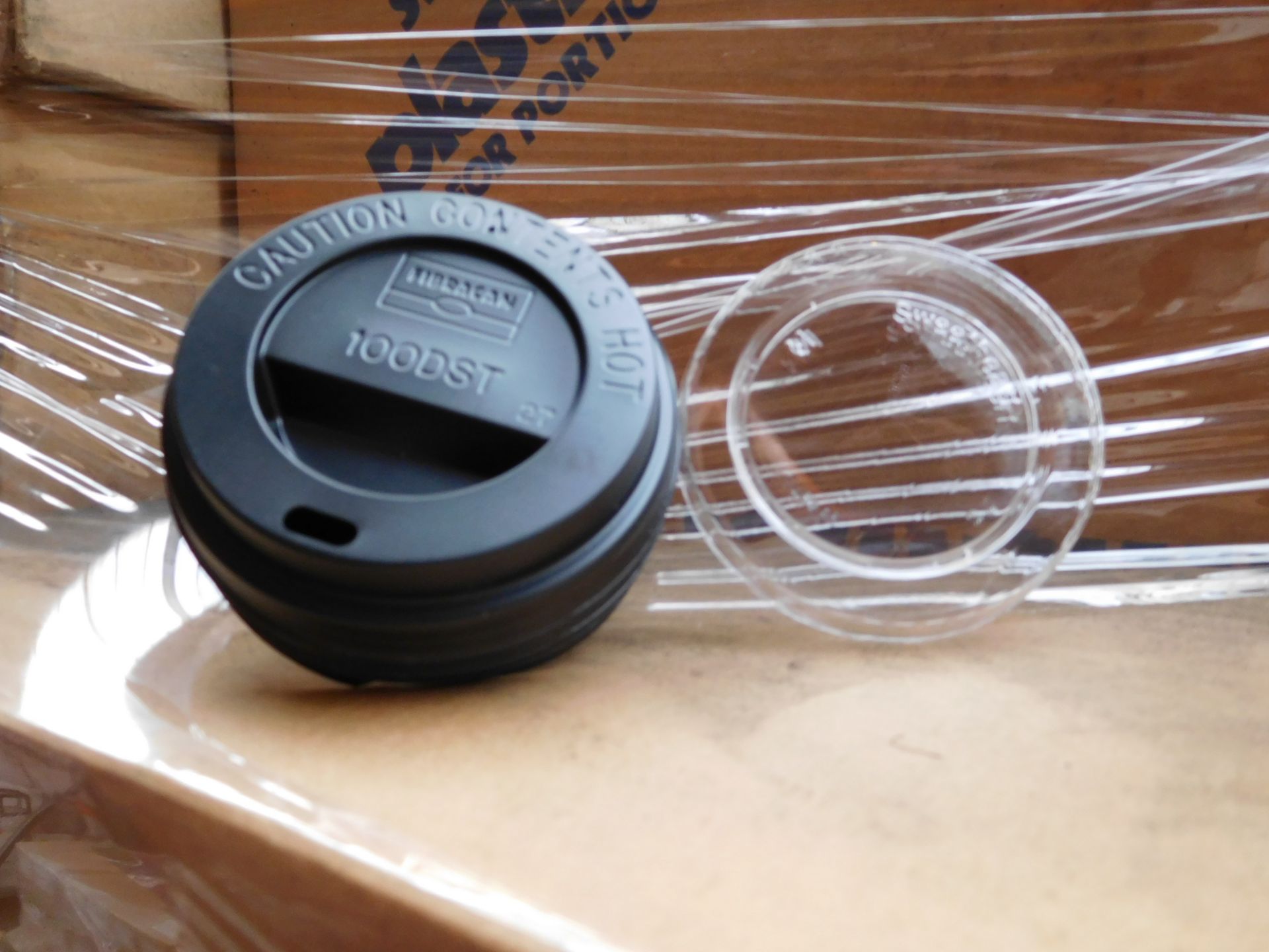 PALLET (C4) TO CONTAIN APPROX 15,000 x 10oz DOMED SIP THROUGH LIDS & 37,500 x PLASTIC LIDS FOR