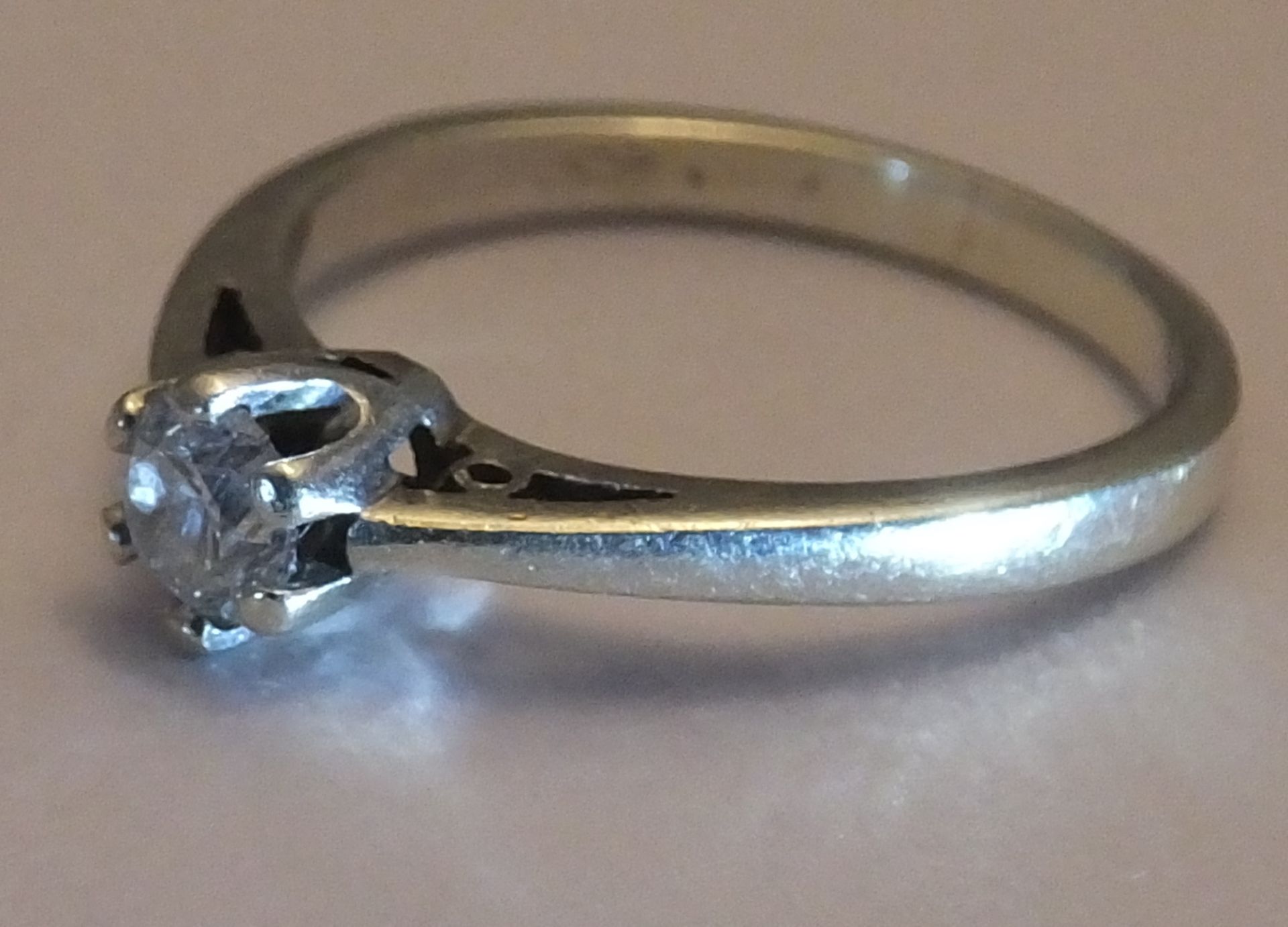 An 9ct White gold Diamond Ring. Size 0. A brilliant cut solitaire diamond of around 0.33 carat. - Image 3 of 3