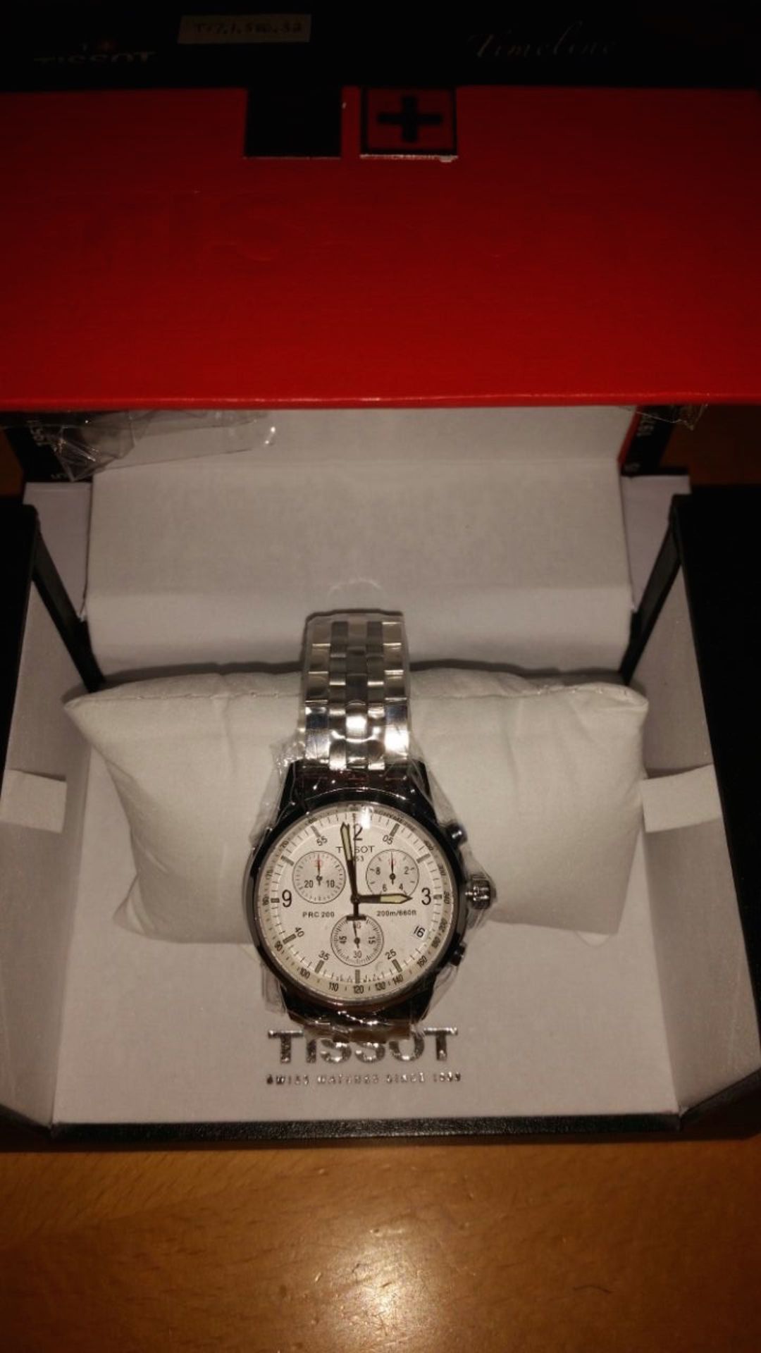 BRAND NEW TISSOT, T17.1 586.32GENTS POLISHED STAINLESS STEEL BRACELET WATCH, WITH A WHITE CIRCULAR