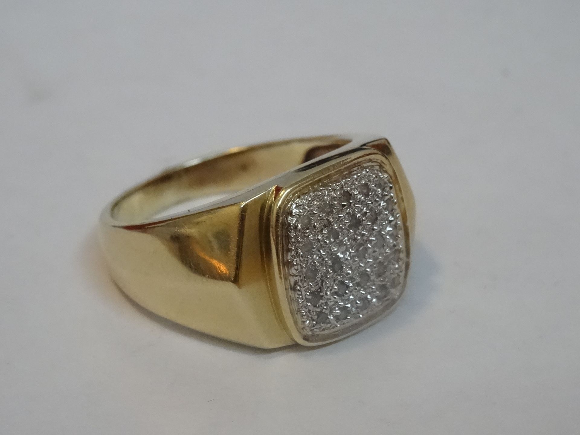 9 Carat Yellow Gold Gents Diamond Ring. Containing 0.25 Carats of High Quality Diamonds.