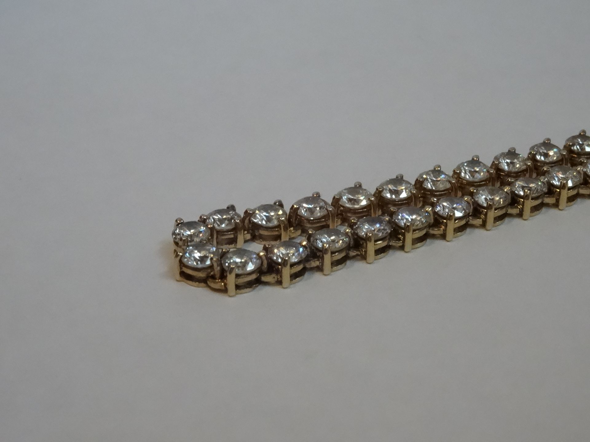 9 Carat Yellow Gold Cubic Zirconia Tennis Bracelet. - Image 2 of 4