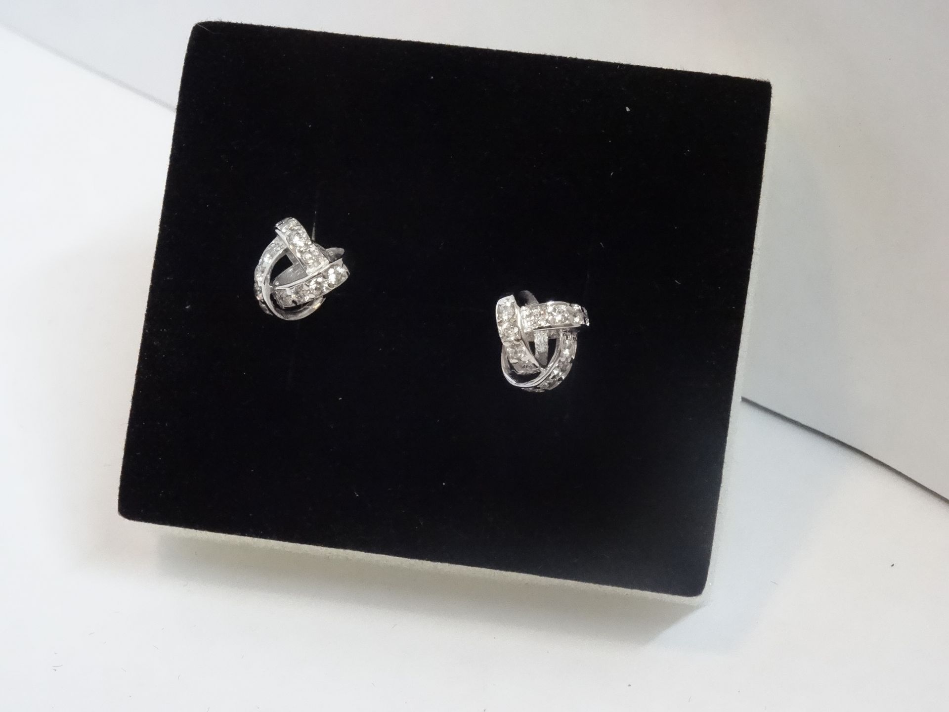 9 Carat White Gold Pair of Cubic Zirconia Twist Knot Design Earrings. - Image 2 of 2