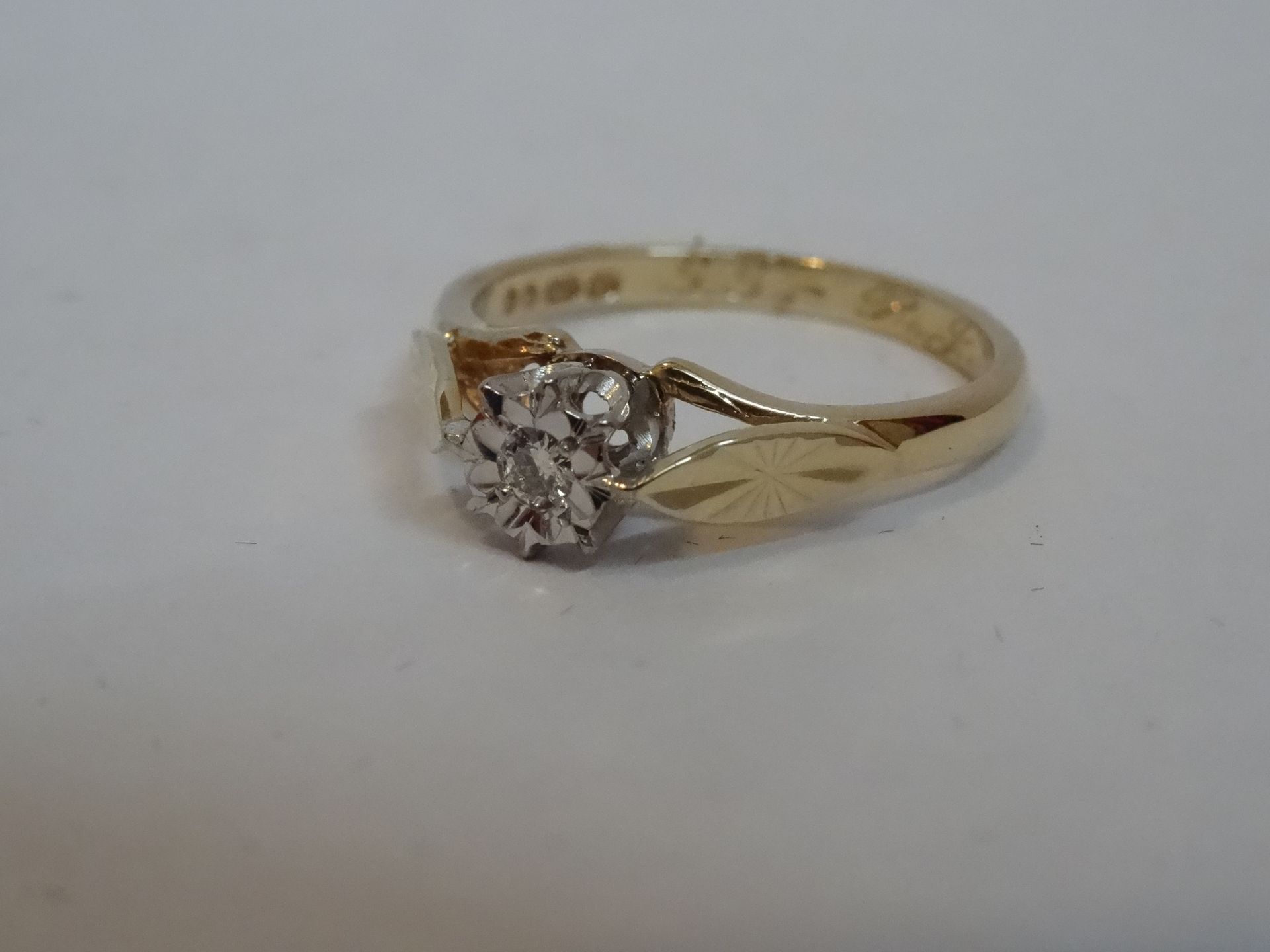 9 Carat Yellow Gold Single Stone Diamond Ring. Total Piece Weight 1.94 Grams