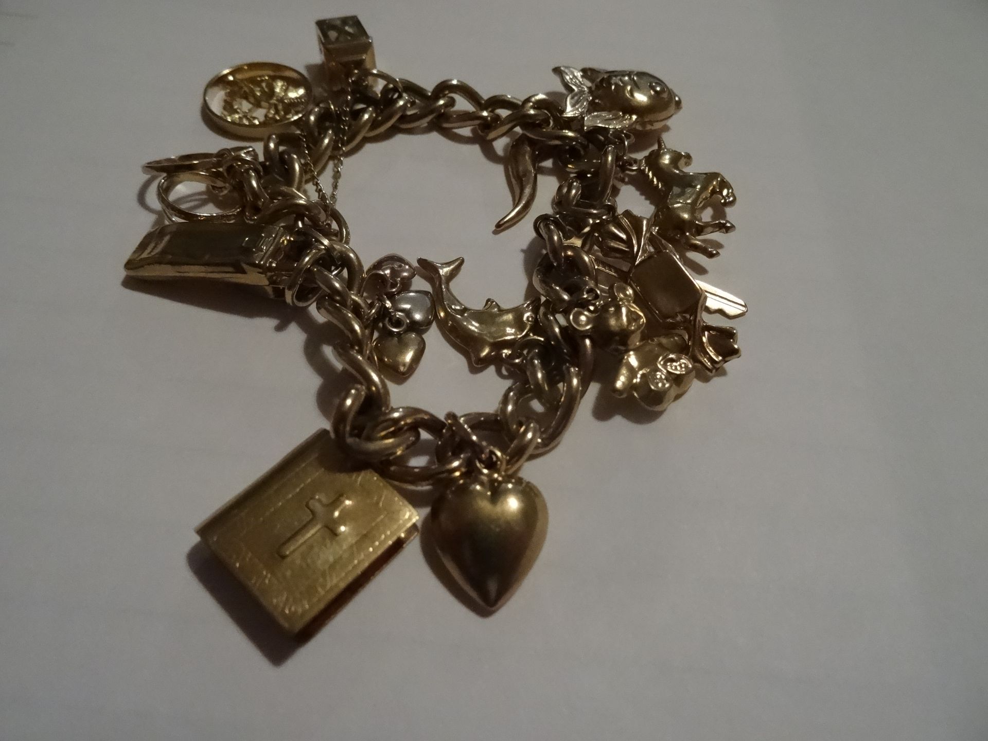 9 CARAT YELLOW GOLD CHARM BRACELET. 14 charms - Image 2 of 4