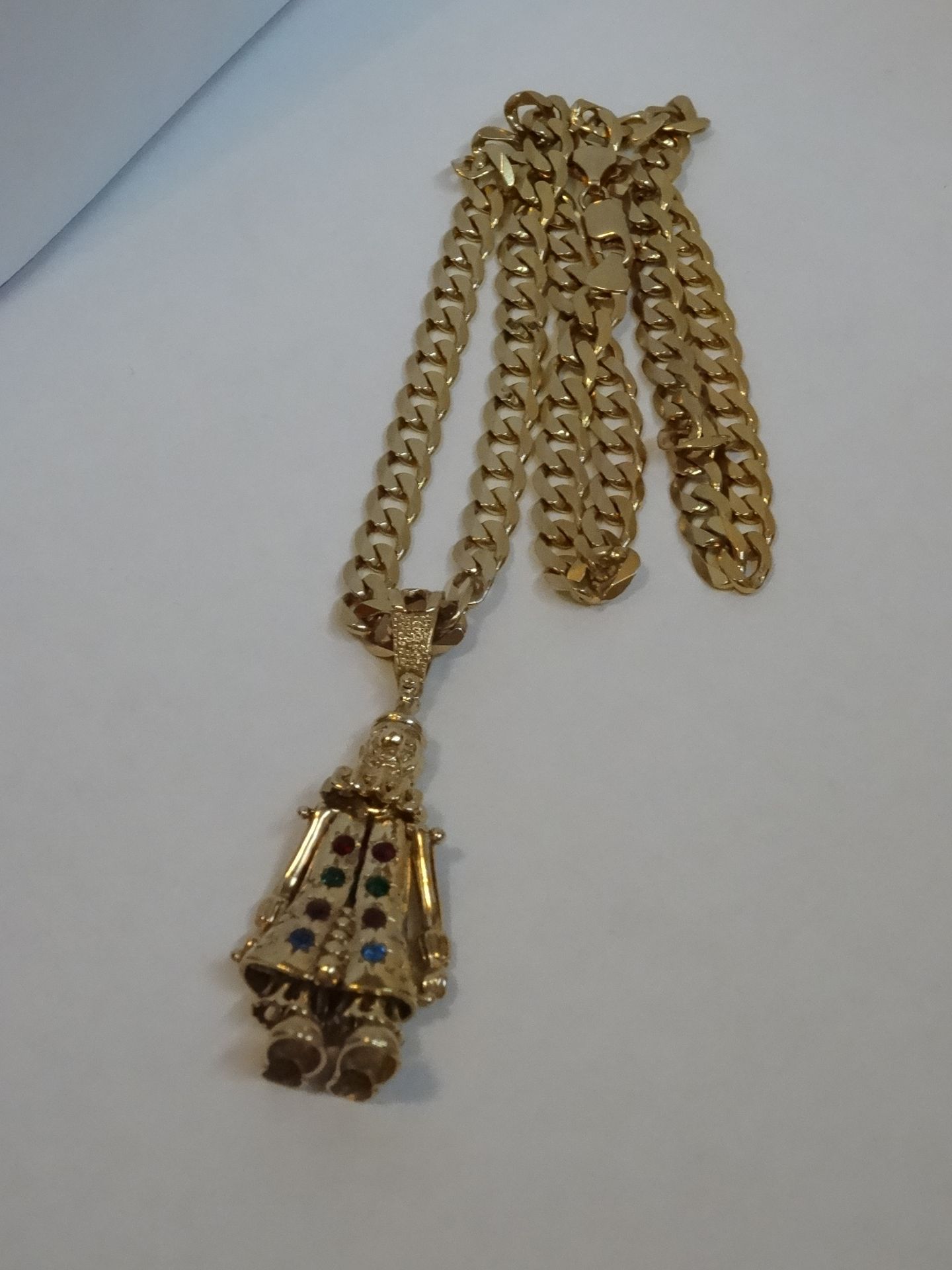 9 Carat Yellow Gold Curb Chain & Moveable Clown Pendant.