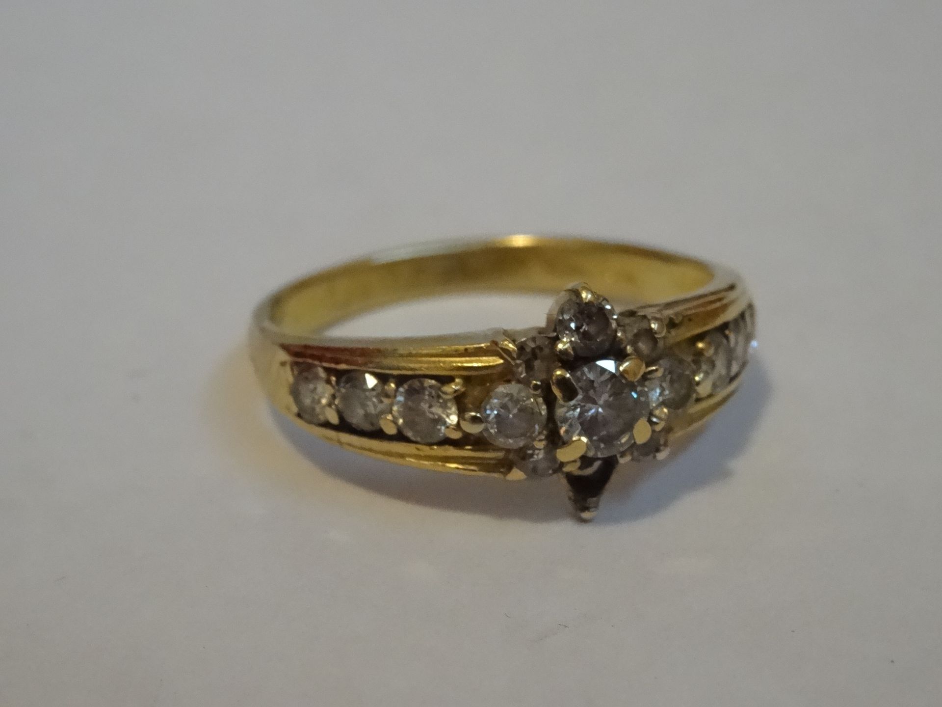 18 Carat Yellow Gold Diamond Cluster Ring.