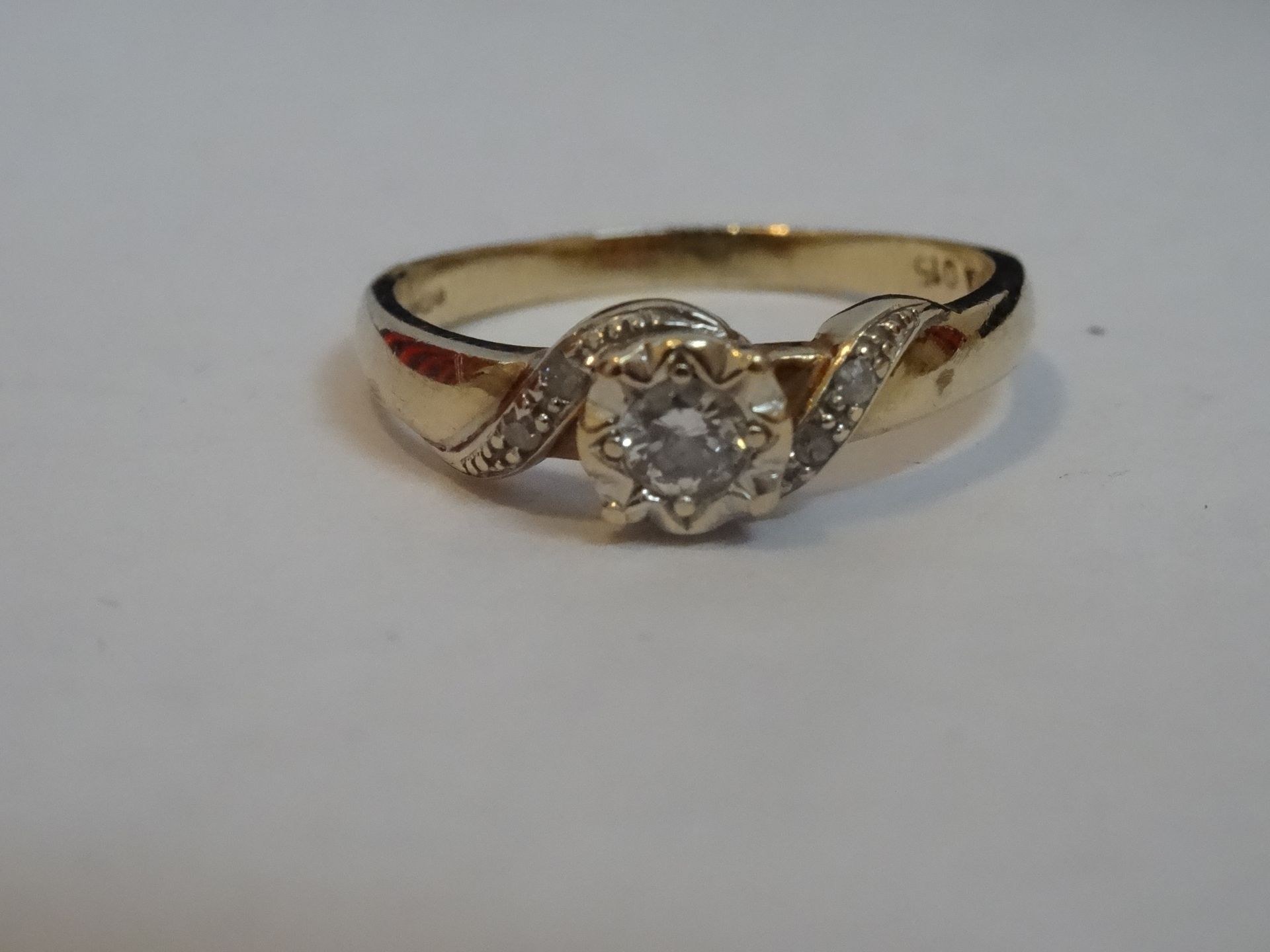 9 Carat Yellow Gold 0.15 Carat Diamond Ring. Total Piece Weight 1.9 Grams. Diamonds set in the