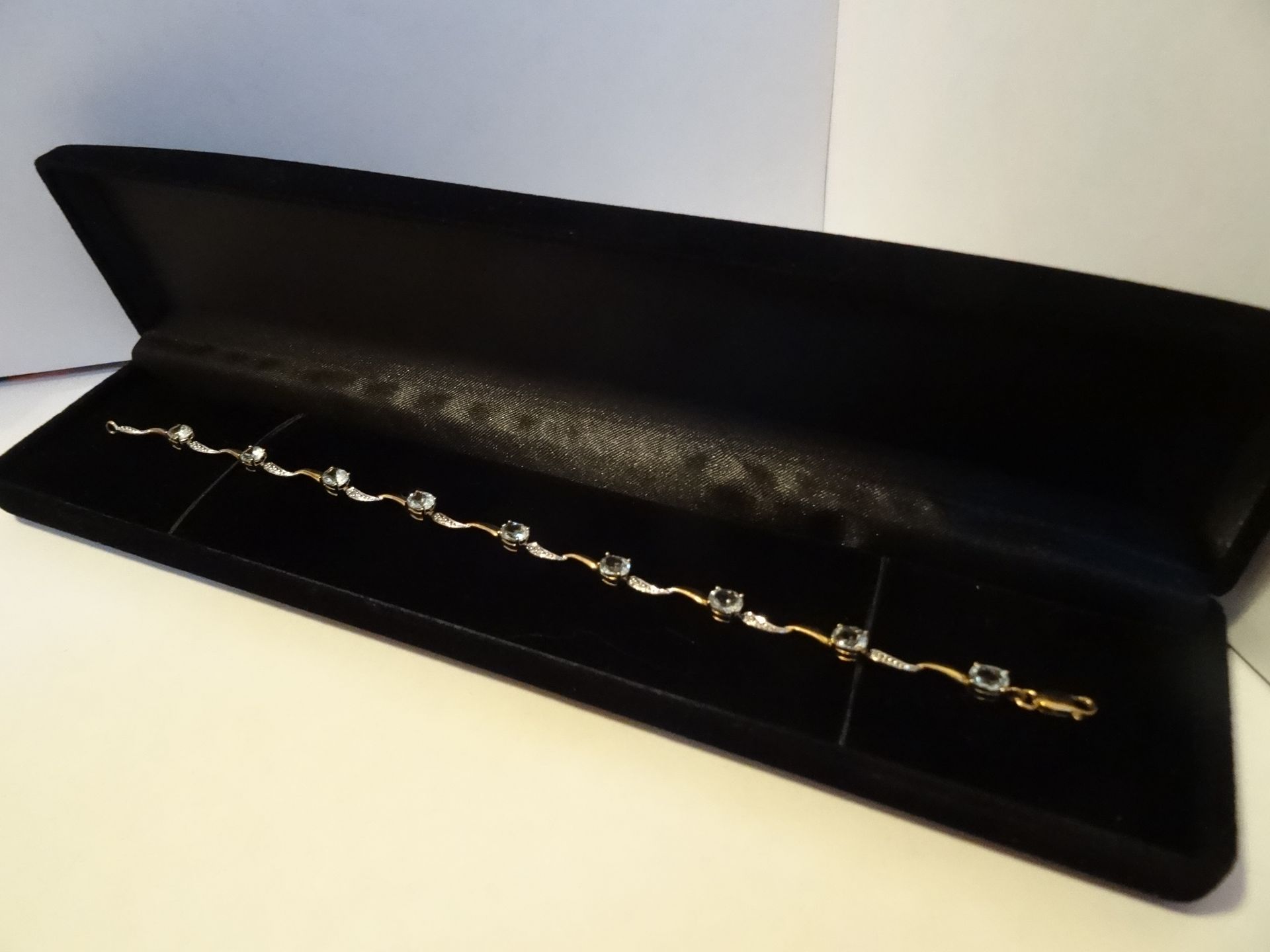 9 Carat Yellow Gold Diamond Criss Cross Design Bracelet.