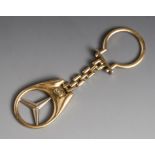 Mercedes-Schlüsselanhänger, Gelbgold 750, Italien, L. ca. 8,5 cm, ca. 13,5 gr.Mindestpreis: 300 EUR