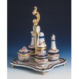 Sevres, Menage, Porzellan/Metall, Blumen- u. Rankendekor, insg. neun Teile.Mindestpreis: 180 EUR