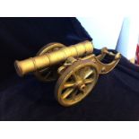 An ornamental cannon (60 cm long by 24 cm tall at highest)