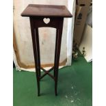 Plant stand with heart motif