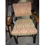 Four Oak dining chairs with fabric seats and backs and two carvers,