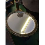 Oval gilt framed mirror