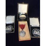 A selection of solid silver commemorative medals and one none silver. The tokens are hallmarked.