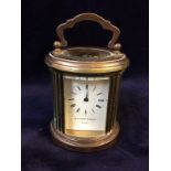 Miniature Oval Carriage Clock by Matthew Norman of London 1940's -1950's