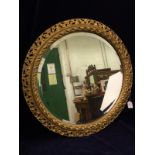 A finely carved wooden framed Victorian Mirror