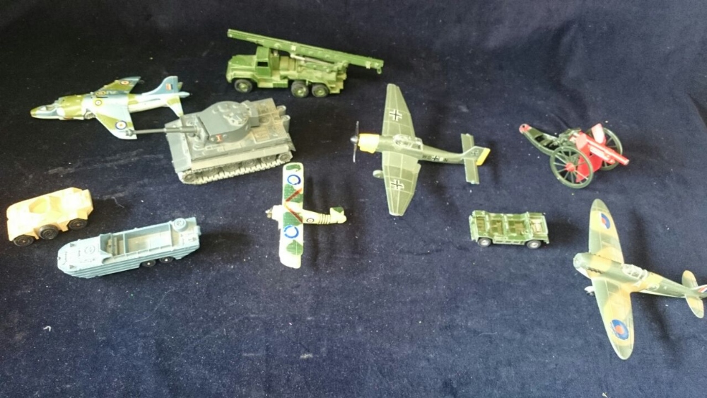 Approx' 20 Dinky and Matchbox military toys including planes and tanks.