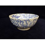 A blue white Oriental bowl 17 cm diameter and 8 cm tall