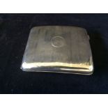 A silver hallmarked cigarette case Birmingham 1922 139 grms