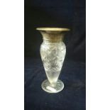 A glass vase with silver top hallmarked Birmingham 1922