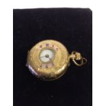 Half hunter gold pocket watch