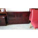 Small Oriental style sideboard with two cupboards and two drawers.