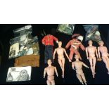 A box of Vintage Action men and uniforms which include Red Devils, Coldstream Guards and