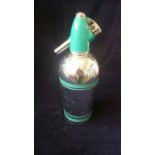 Sparklets Ltd. retro turquoise and silver metal soda syphon.