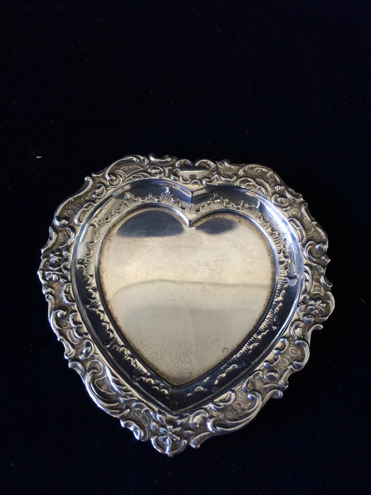 Small, Silver Heart Shaped wedding ring dish.  Marked Birmingham 1997.